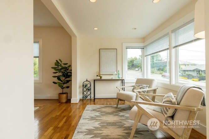 9340 45th Avenue Southwest Seattle, WA 98136 - Photo 10 of 33 a living room with furniture and a large window