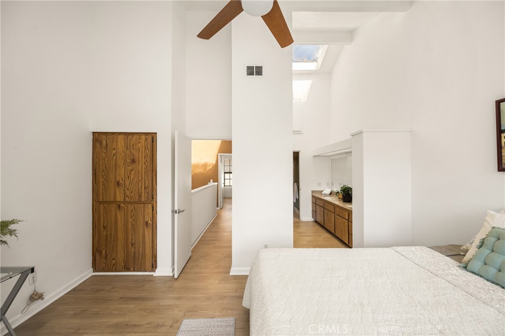 179 Pineview Irvine, CA 92620 - Photo 31 of 51 Looking back from primary bedroom - double vanity with more closet on the right and hall to 2nd bedroom on the left.