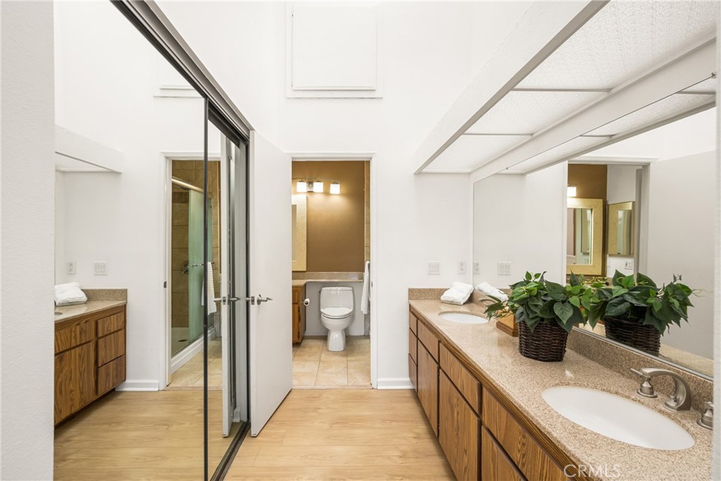 179 Pineview Irvine, CA 92620 - Photo 33 of 51 Double vanity with more closet on the left - private full bath behind.