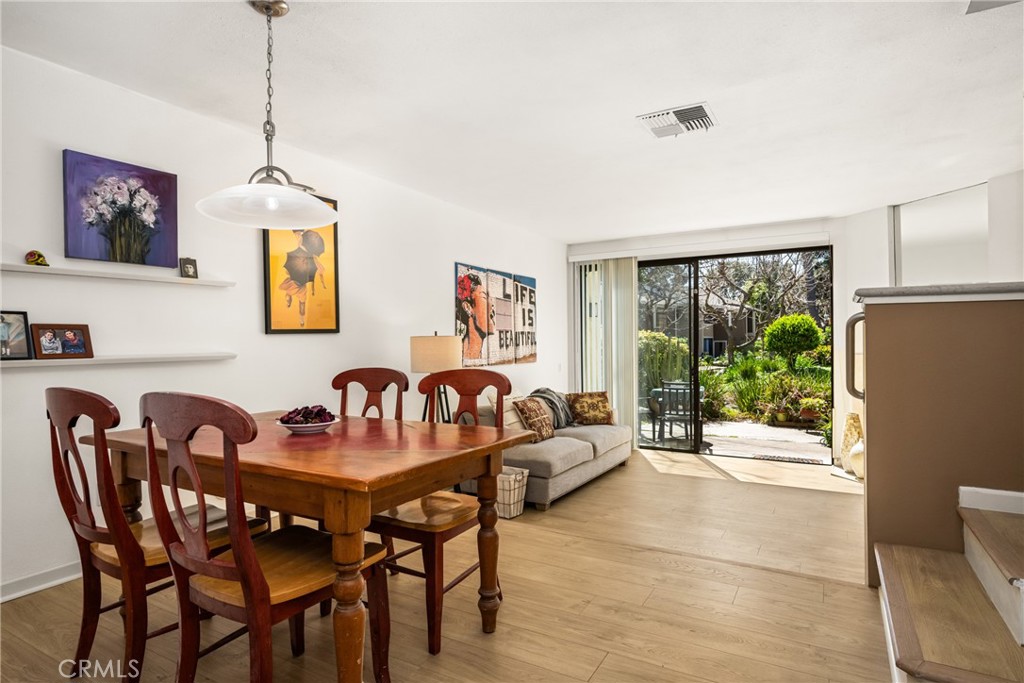 179 Pineview Irvine, CA 92620 - Photo 6 of 51 Dining area with living room and patio and stream in back.