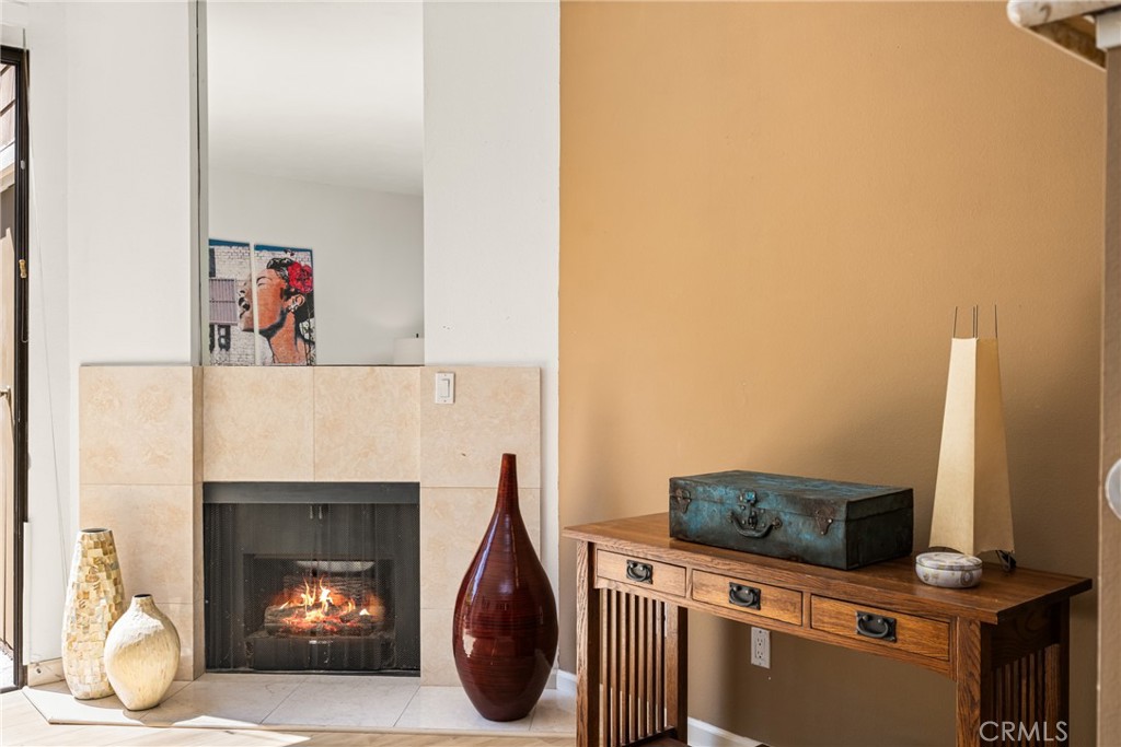 179 Pineview Irvine, CA 92620 - Photo 9 of 51 Close up of the stone, gas fireplace.