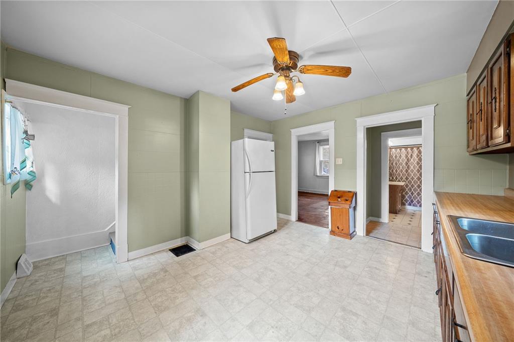 1341 Scrubgrass Road Carnegie, PA 15106 - Photo 10 of 21 wooden floor in an empty room and a bathroom