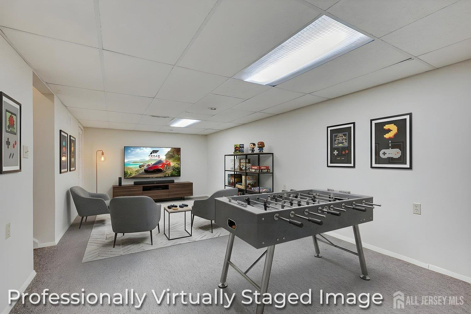 7 Lily Court Edison, NJ 08820 - Photo 24 of 32 a workspace with furniture and a flat screen tv