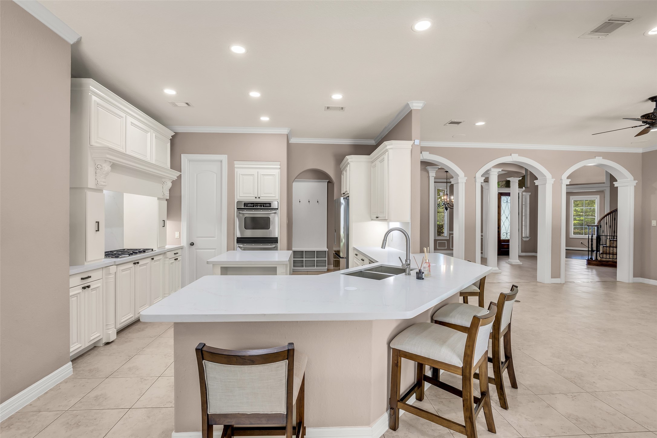 27434 Whispering Maple Way Spring, TX 77386 - Photo 12 of 41 Kitchen has been remodeled with quartz counters. Boasts double ovens, gas cooktopand walk in pantry as well has breakfast bar