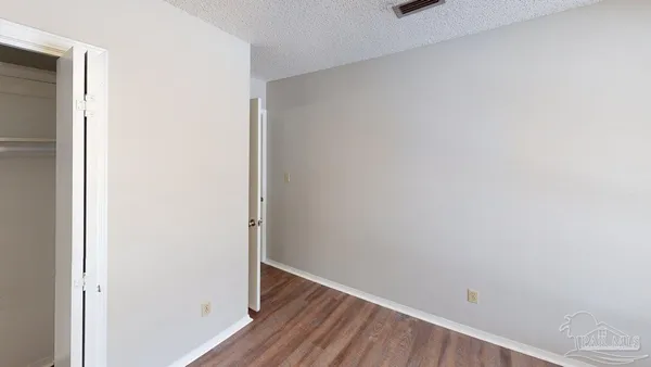 a view of small space with wooden floor