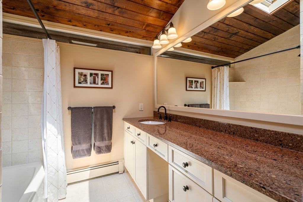 60 Pine Street Dover, MA 02030 - Photo 22 of 36 a kitchen with a sink and cabinets