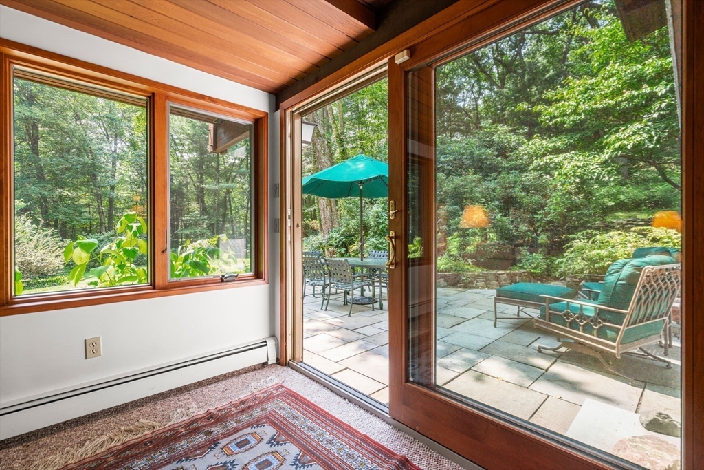 60 Pine Street Dover, MA 02030 - Photo 30 of 36 a view of a room with wooden floor and outdoor view