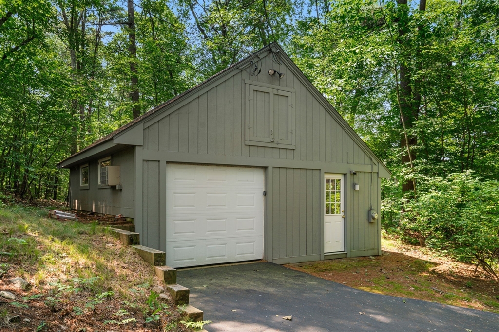 60 Pine Street Dover, MA 02030 - Photo 35 of 36 a front view of house with yard