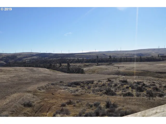 a view of an ocean and mountain
