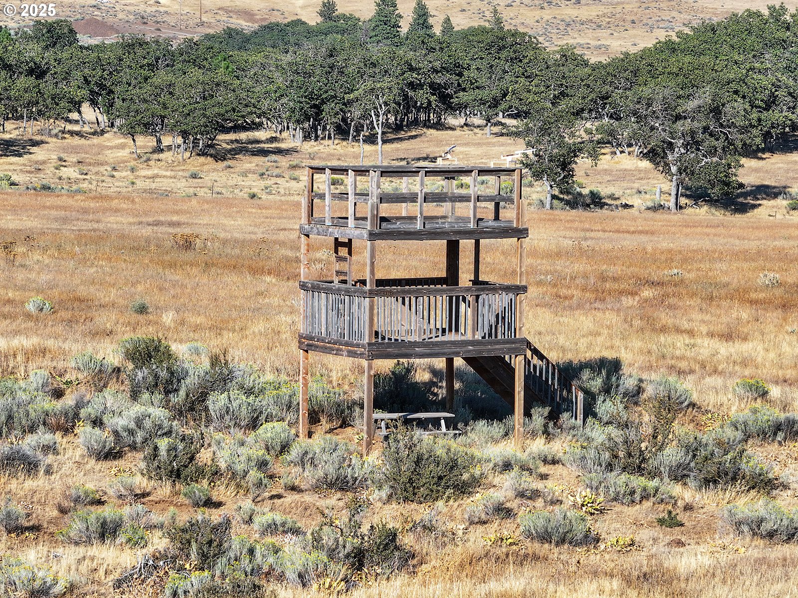 Lightening Lane Goldendale, WA 98620 - Photo 24 of 37 a view of a lake with a mountain in the background
