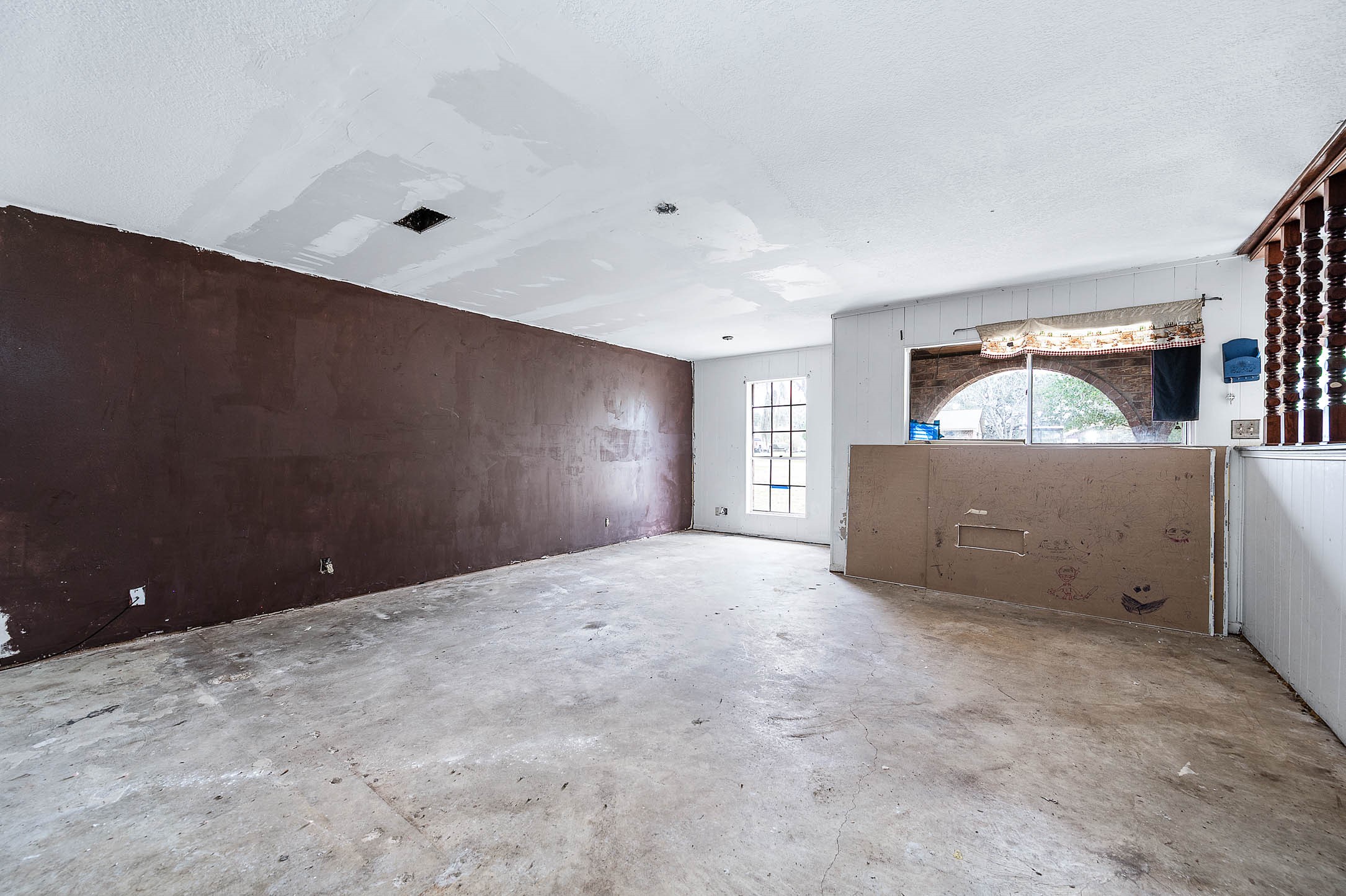 1431 County Road 934 Sweeny, TX 77480 - Photo 15 of 21 a view of an empty room with a window and fireplace