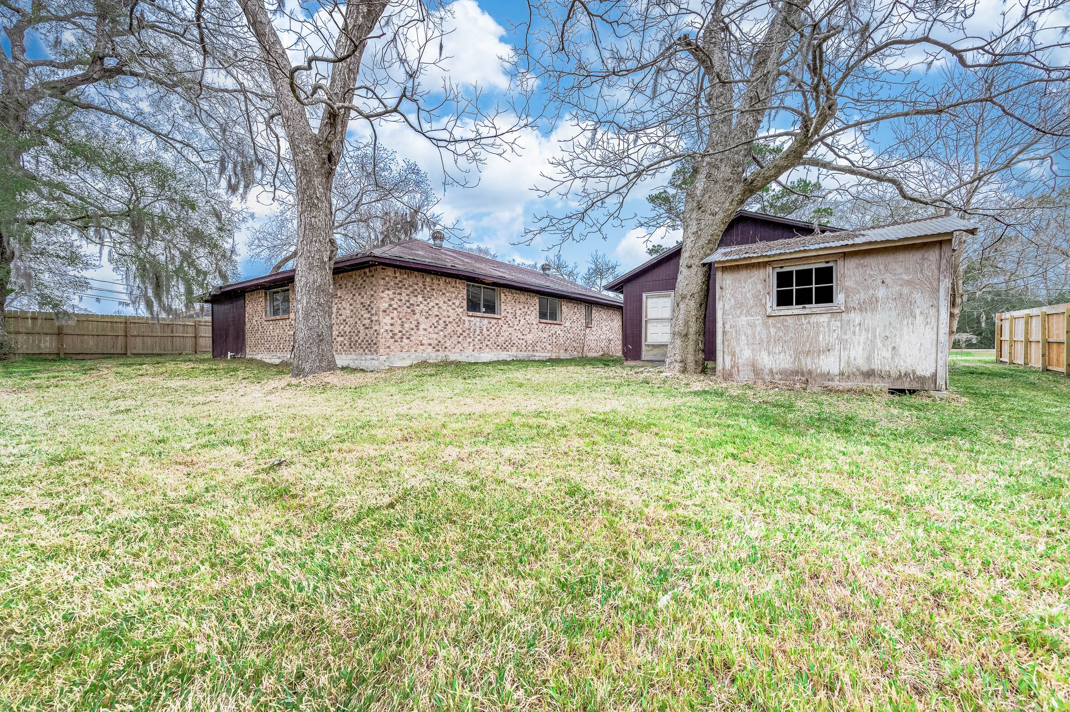 1431 County Road 934 Sweeny, TX 77480 - Photo 20 of 21 a view of a house with a yard