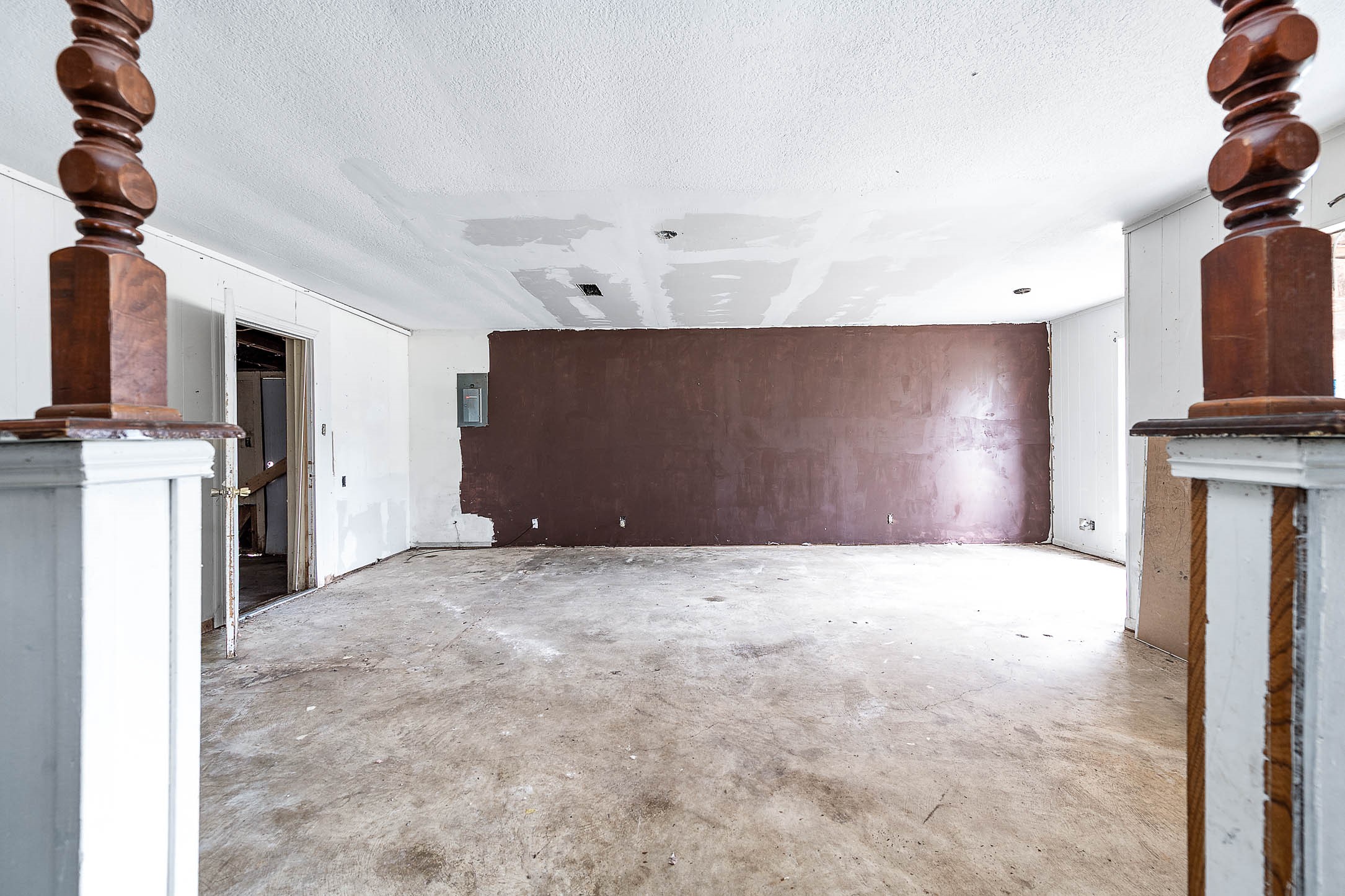 1431 County Road 934 Sweeny, TX 77480 - Photo 10 of 21 a view of a kitchen with furniture and a fireplace