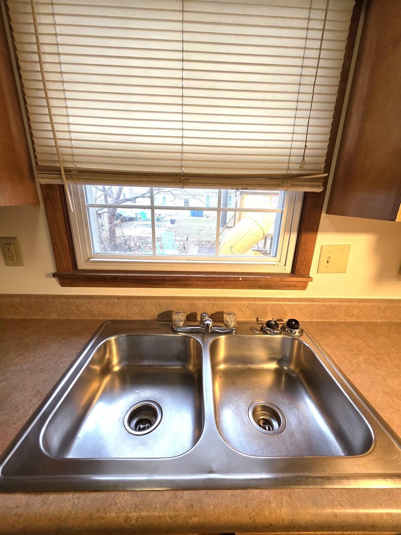 331 West Main Street Olney, IL 62450 - Photo 16 of 58 a close view of sink and a stove