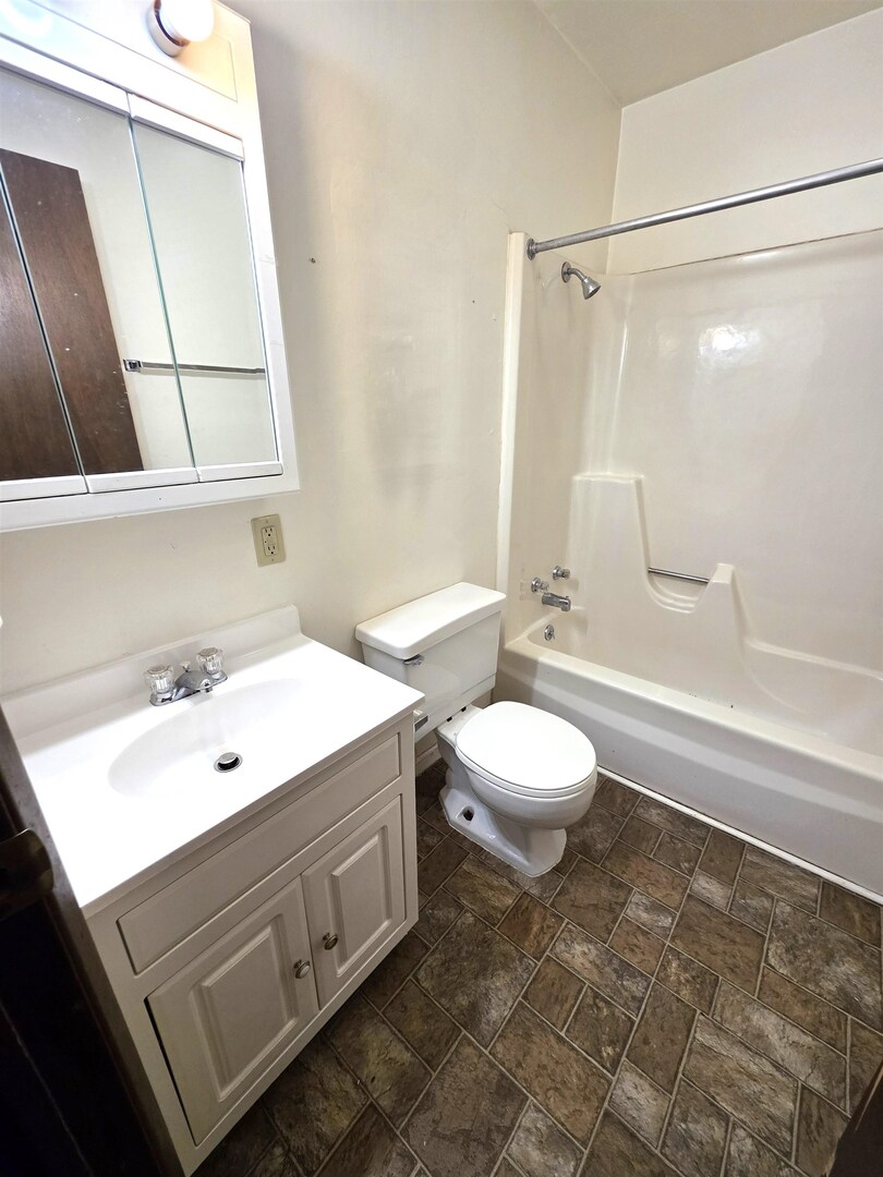 331 West Main Street Olney, IL 62450 - Photo 19 of 58 a bathroom with a sink and a mirror