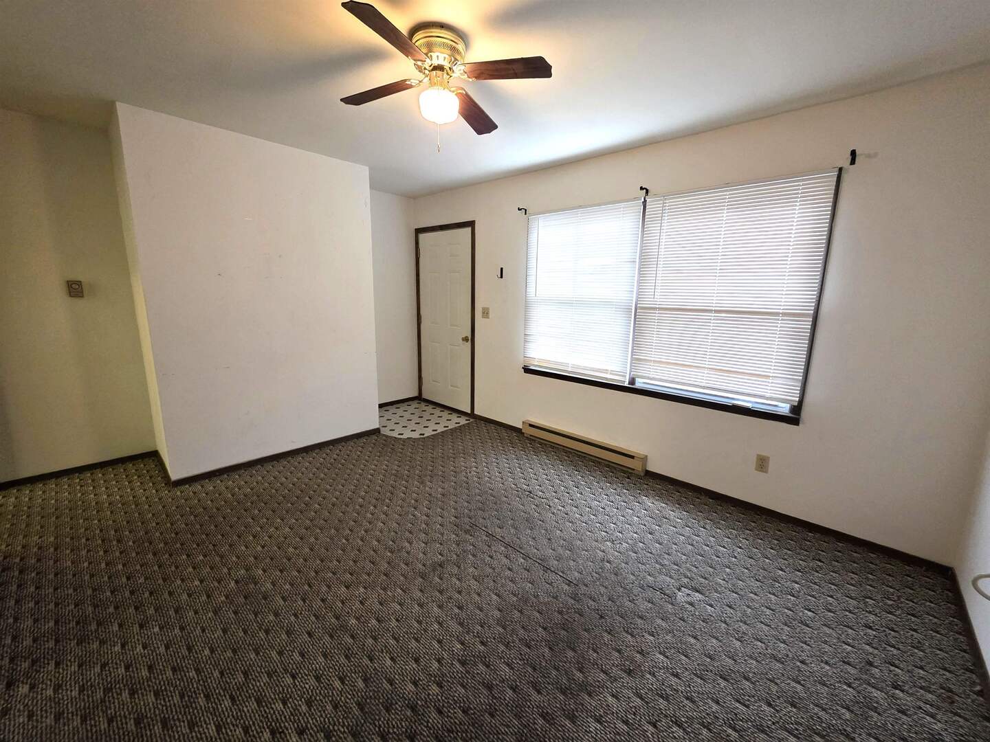 331 West Main Street Olney, IL 62450 - Photo 32 of 58 a view of an empty room with a window