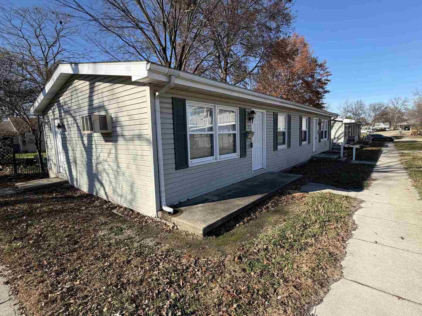 331 West Main Street Olney, IL 62450 - Photo 4 of 58 a view of a house with a yard next to a road