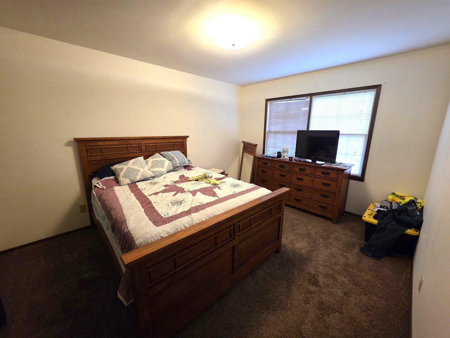 331 West Main Street Olney, IL 62450 - Photo 42 of 58 a bedroom with a bed and a flat screen tv