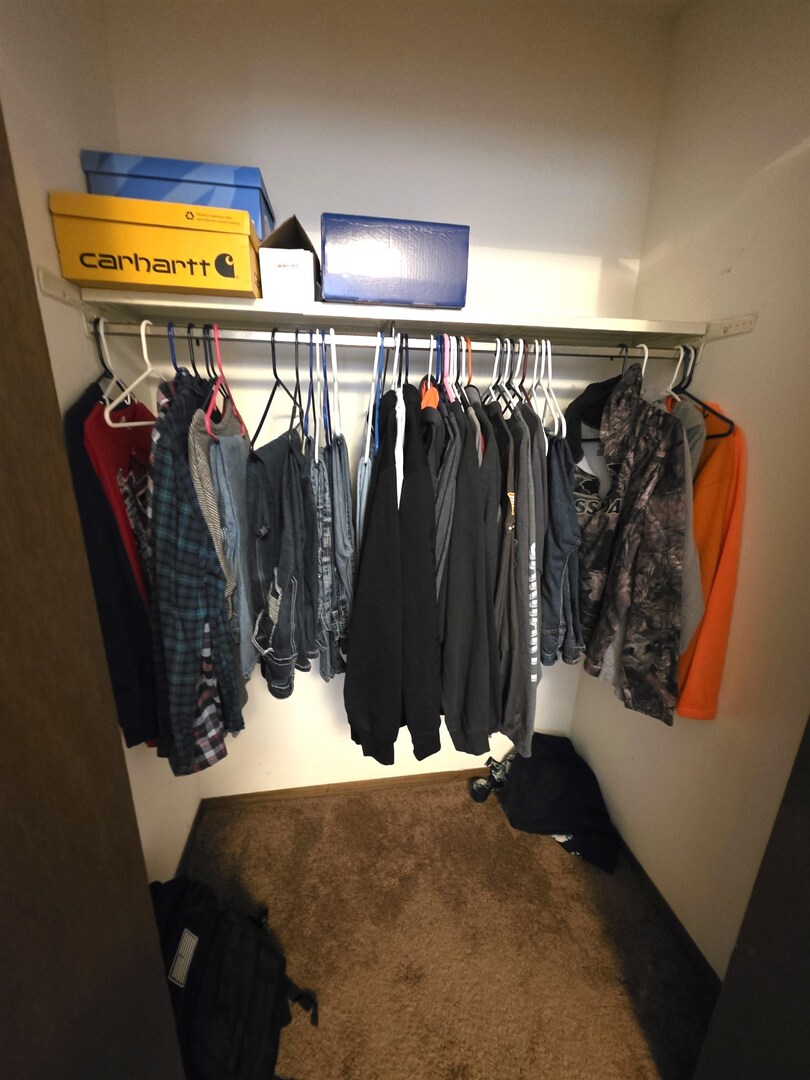 331 West Main Street Olney, IL 62450 - Photo 43 of 58 a view of walk in closet with clothes and shoes