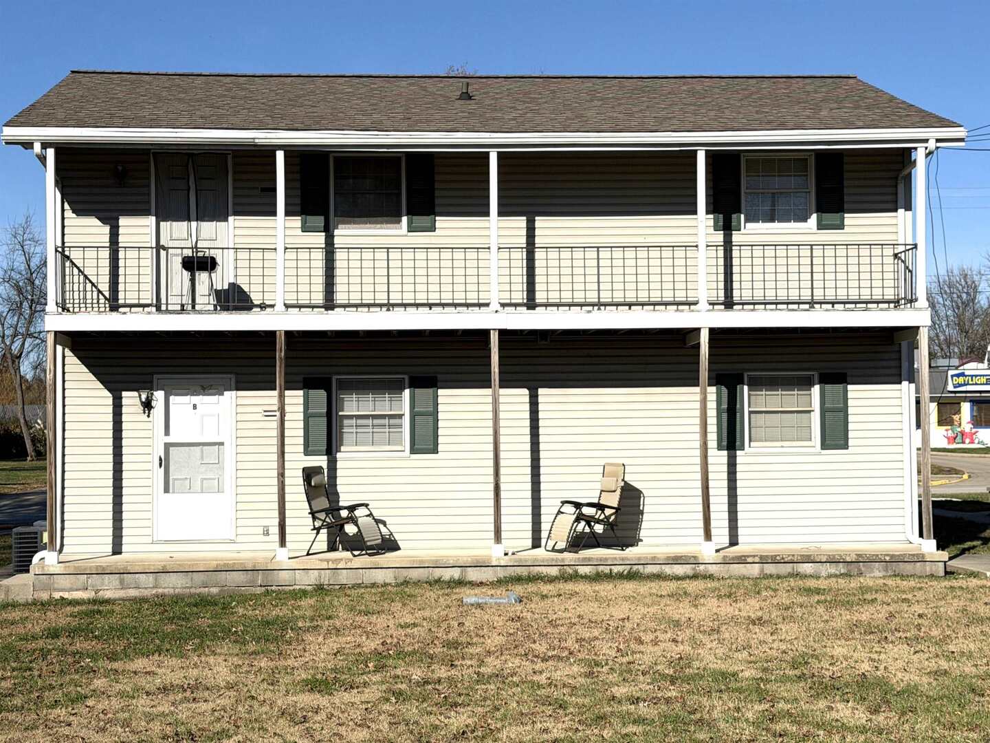 331 West Main Street Olney, IL 62450 - Photo 56 of 58 a front view of a house with a yard