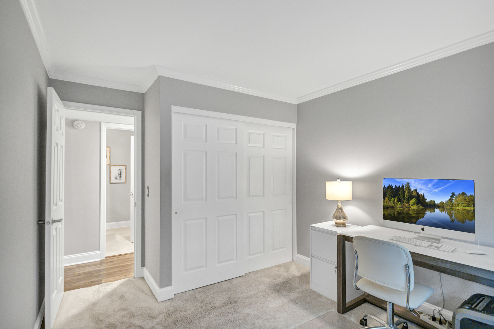 1256 Plum Tree Court, Unit D1 Schaumburg, IL 60193 - Photo 18 of 40 a view of a workspace with furniture and a window