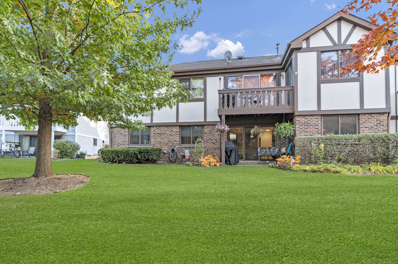 1256 Plum Tree Court, Unit D1 Schaumburg, IL 60193 - Photo 22 of 40 a view of a street with of building and a big yard