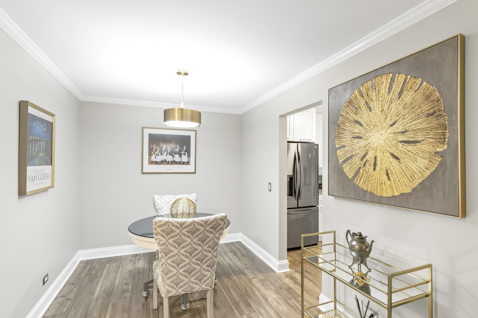 1256 Plum Tree Court, Unit D1 Schaumburg, IL 60193 - Photo 6 of 40 a view of a dining room with furniture and wooden floor