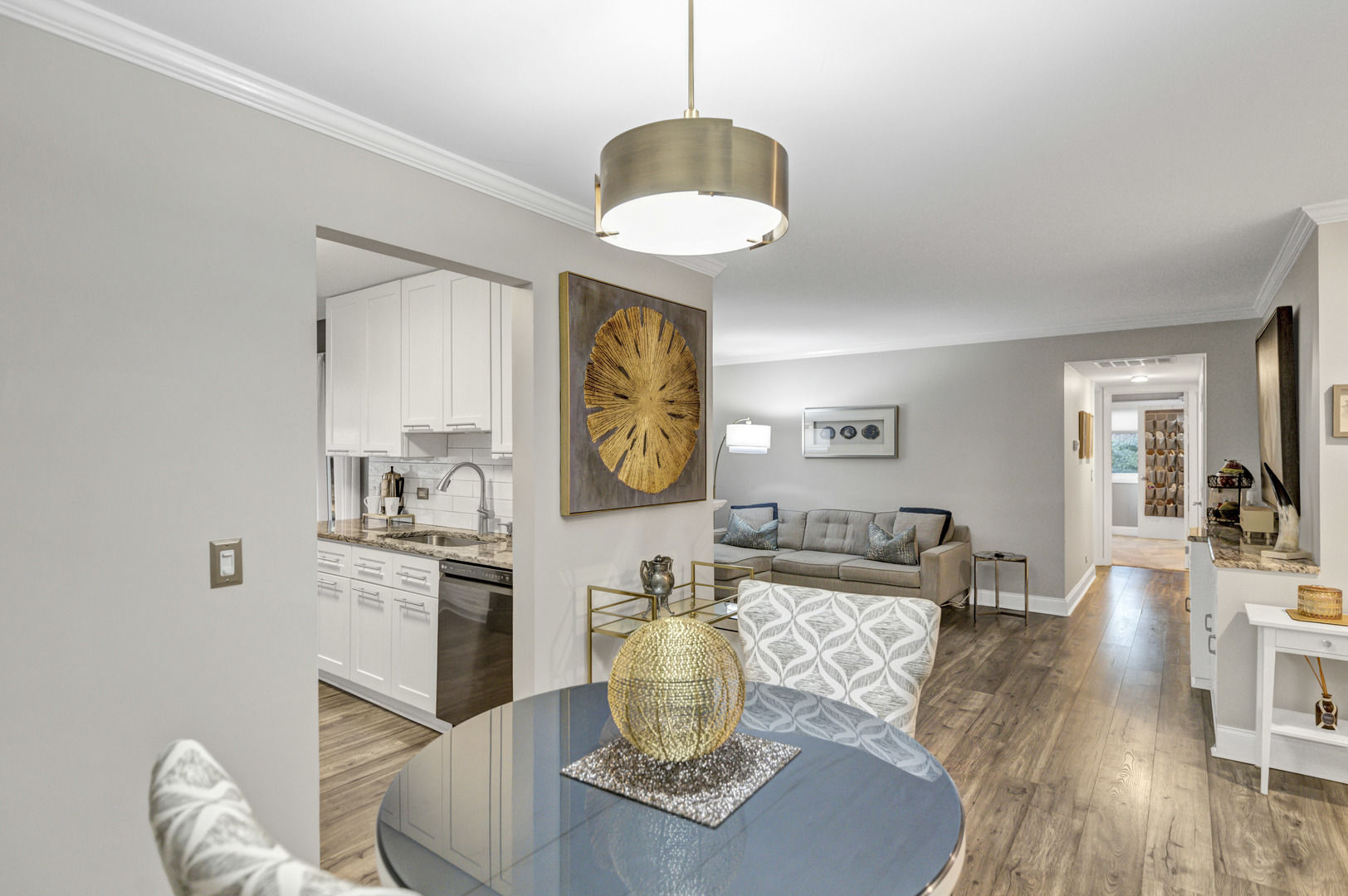 1256 Plum Tree Court, Unit D1 Schaumburg, IL 60193 - Photo 7 of 40 a living room with fireplace furniture and a wooden floor