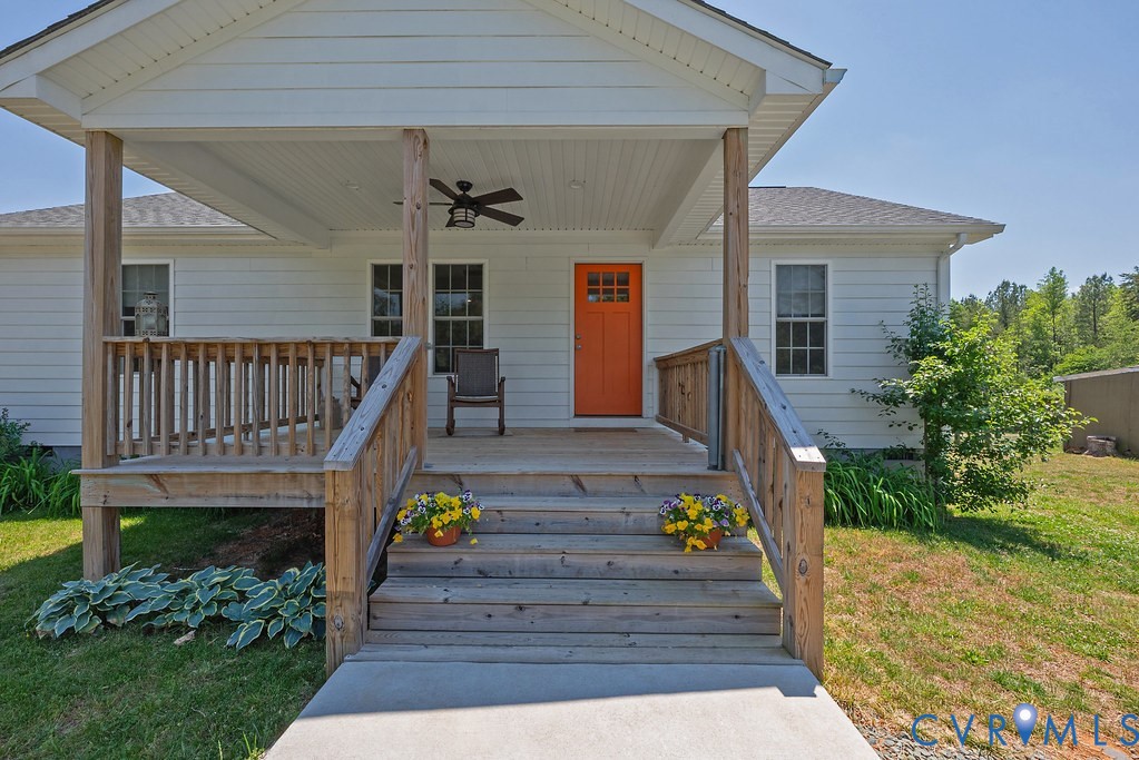 4336 Hells Bend Road Palmyra, VA 22963 - Photo 2 of 35 Inviting front porch with natural wood railing and
