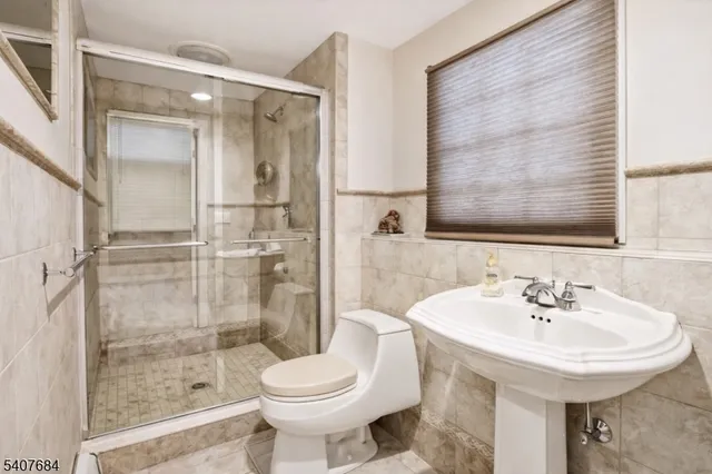 a bathroom with a sink a mirror and a bathtub