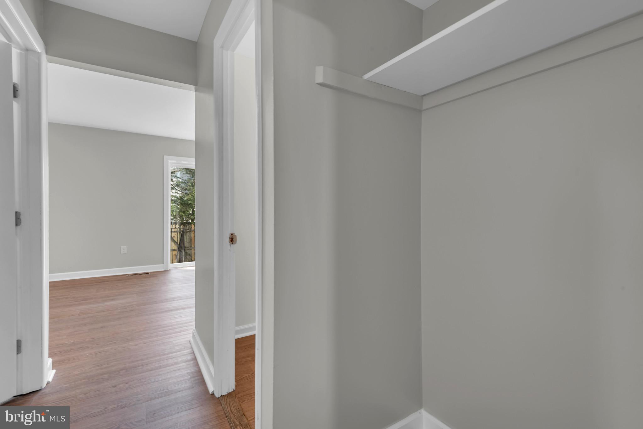 1869 Robin Court Severn, MD 21144 - Photo 19 of 43 a view of a hallway with wooden floor