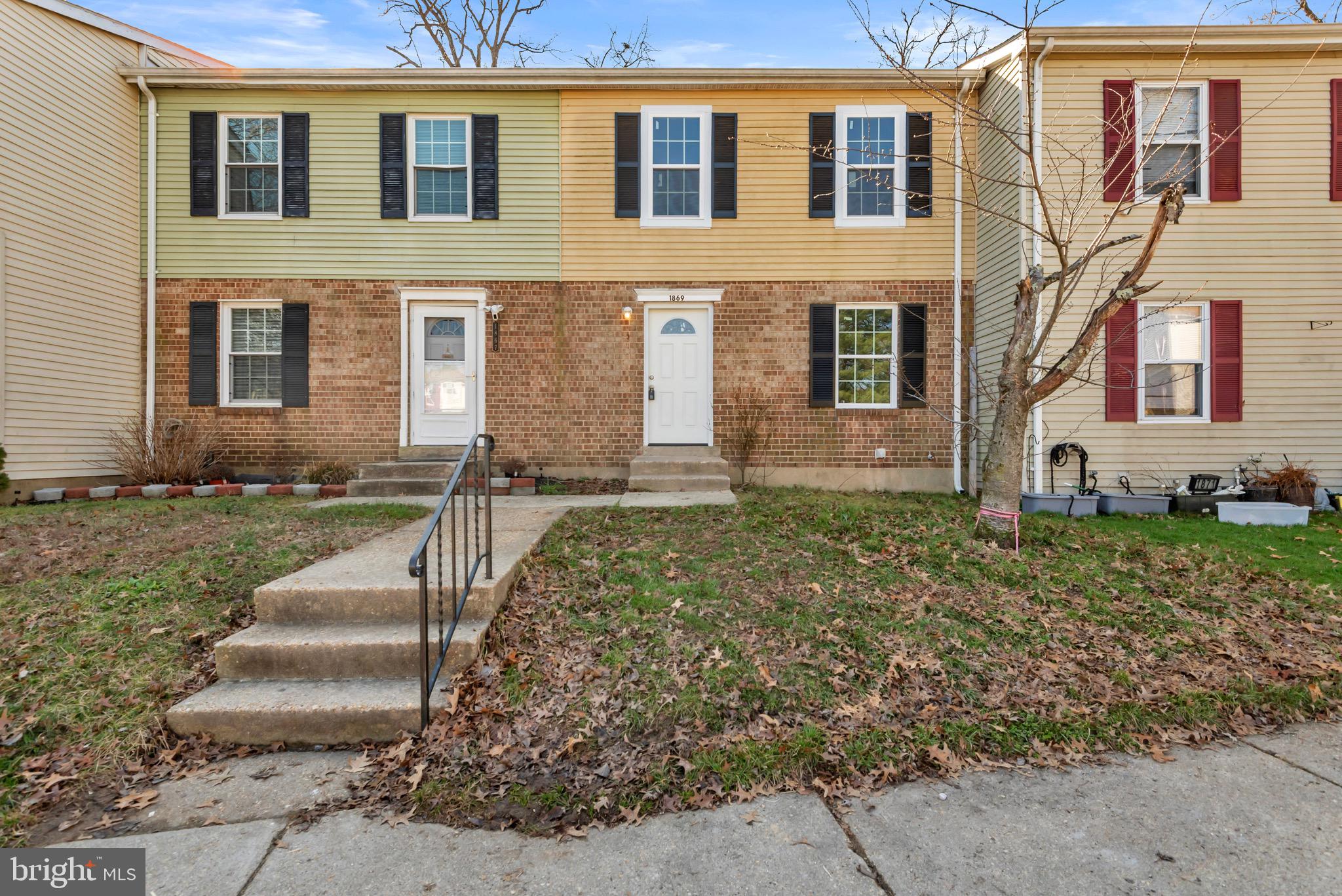 1869 Robin Court Severn, MD 21144 - Photo 2 of 43 a front view of a house with garden