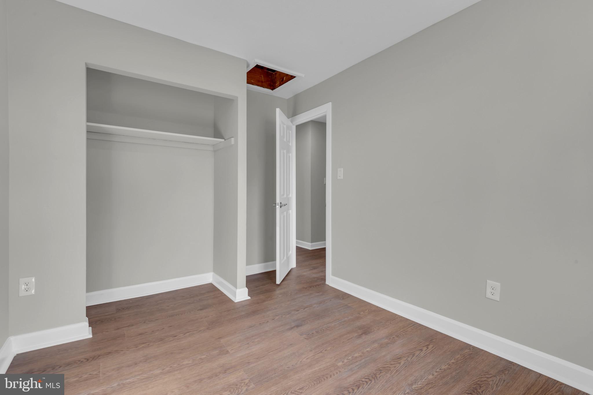 1869 Robin Court Severn, MD 21144 - Photo 29 of 43 a view of an empty room with wooden floor