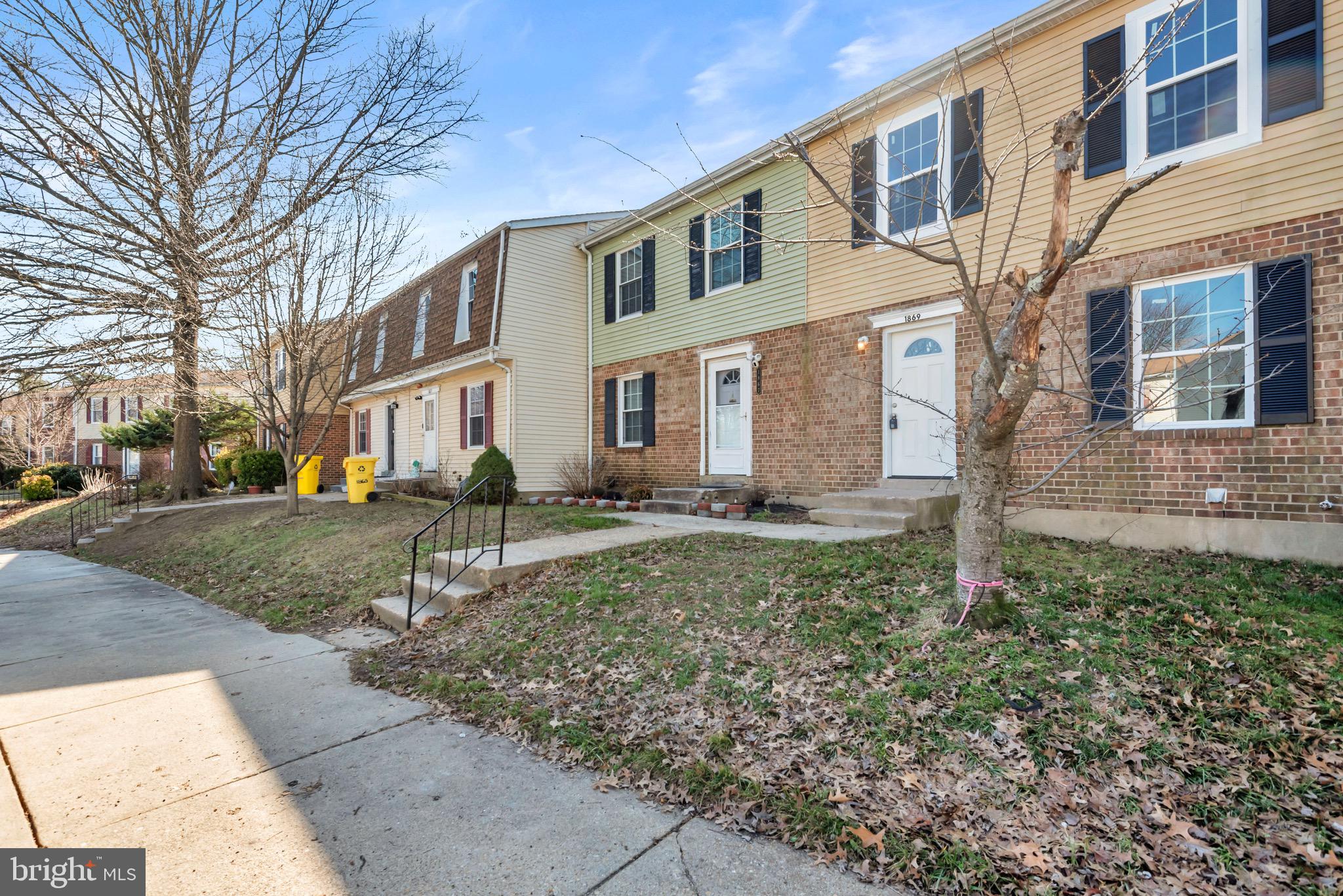 1869 Robin Court Severn, MD 21144 - Photo 4 of 43 a front view of a house with garden