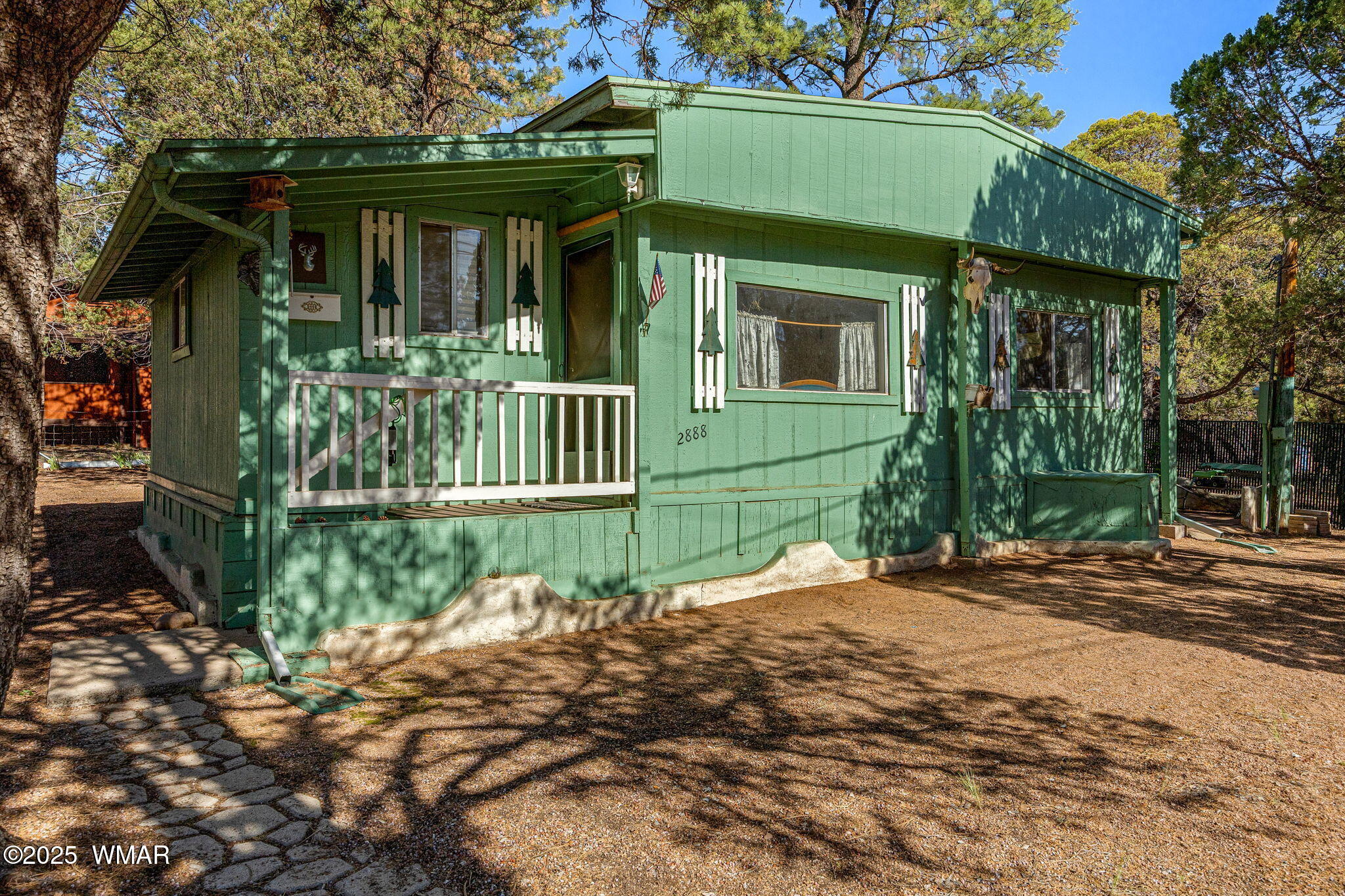2888 Dale Road Overgaard, AZ 85933 - Photo 1 of 31 a front view of a house