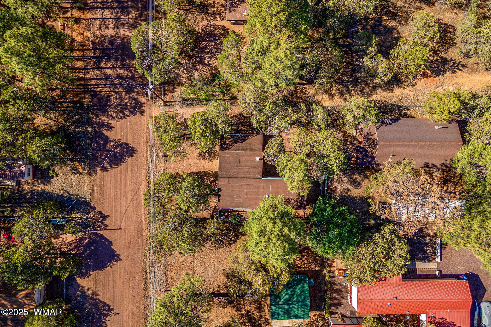 2888 Dale Road Overgaard, AZ 85933 - Photo 24 of 31 an aerial view of a house with a yard