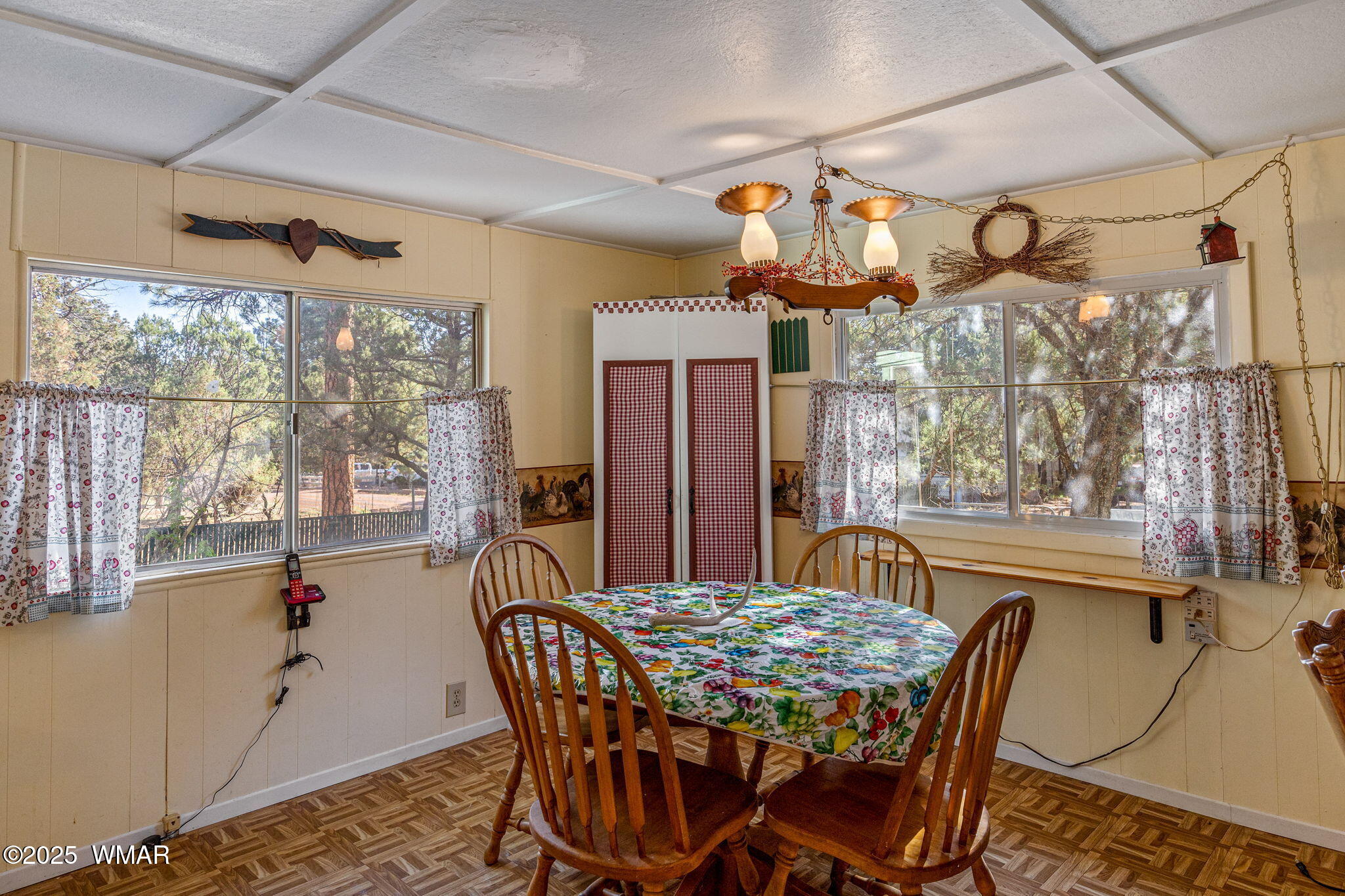 2888 Dale Road Overgaard, AZ 85933 - Photo 3 of 31 a view of a dining room with furniture window and outside view