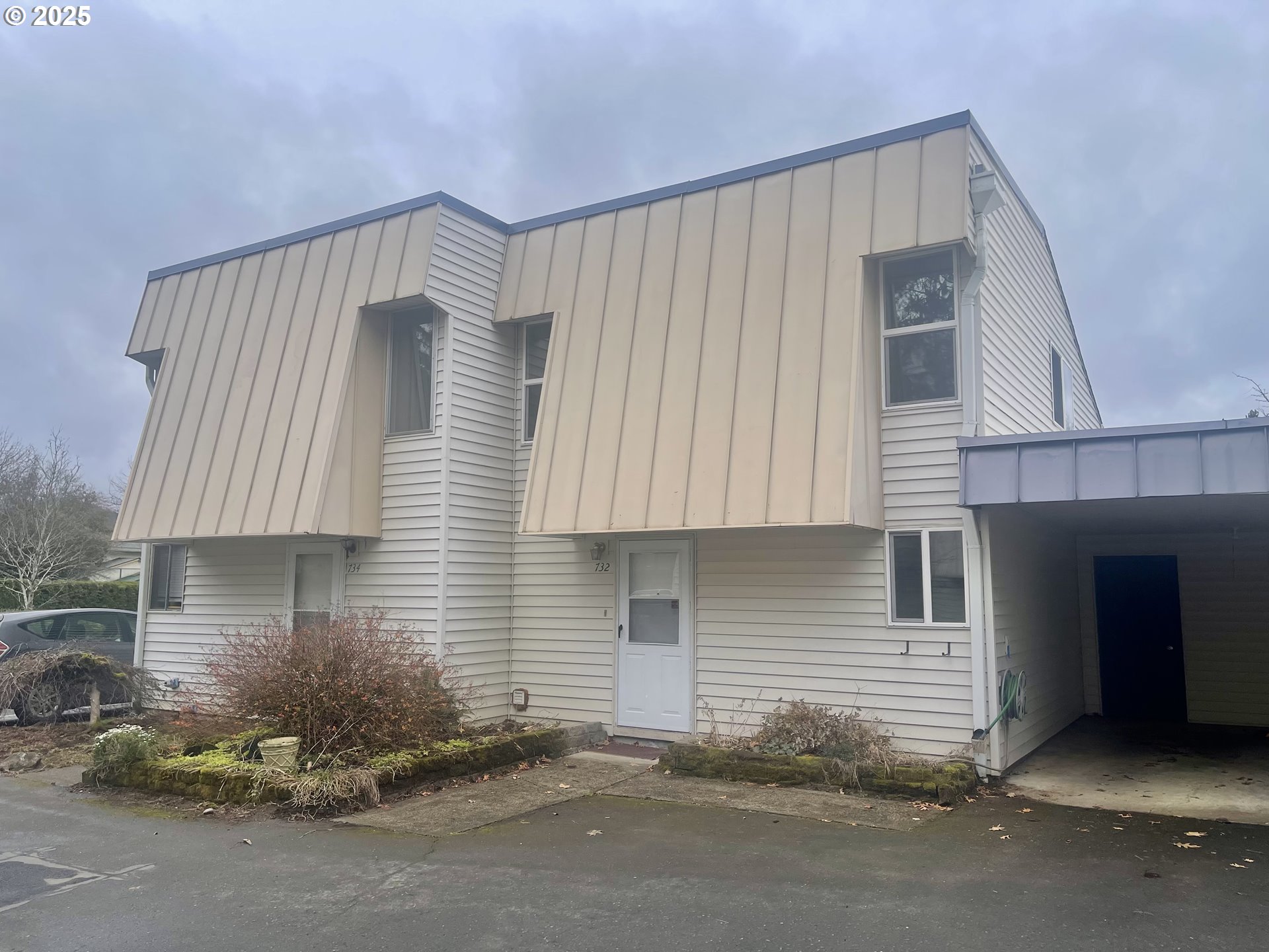 732 Southeast Rene Avenue Gresham, OR 97080 - Photo 1 of 11 a front view of a house with a garage