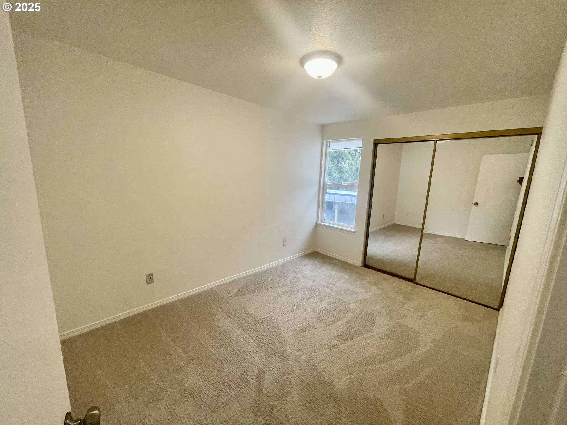 732 Southeast Rene Avenue Gresham, OR 97080 - Photo 10 of 11 a view of an empty room