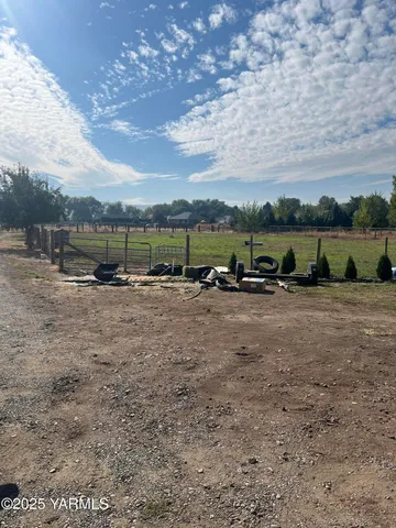 a view of a backyard with a patio