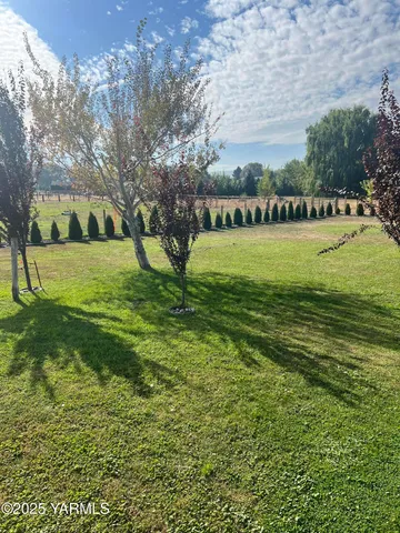 a view of an outdoor space and a yard