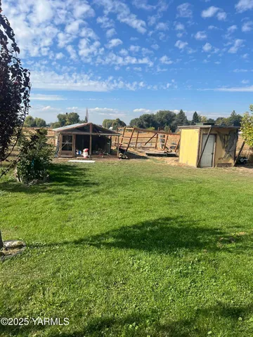a view of outdoor space and yard