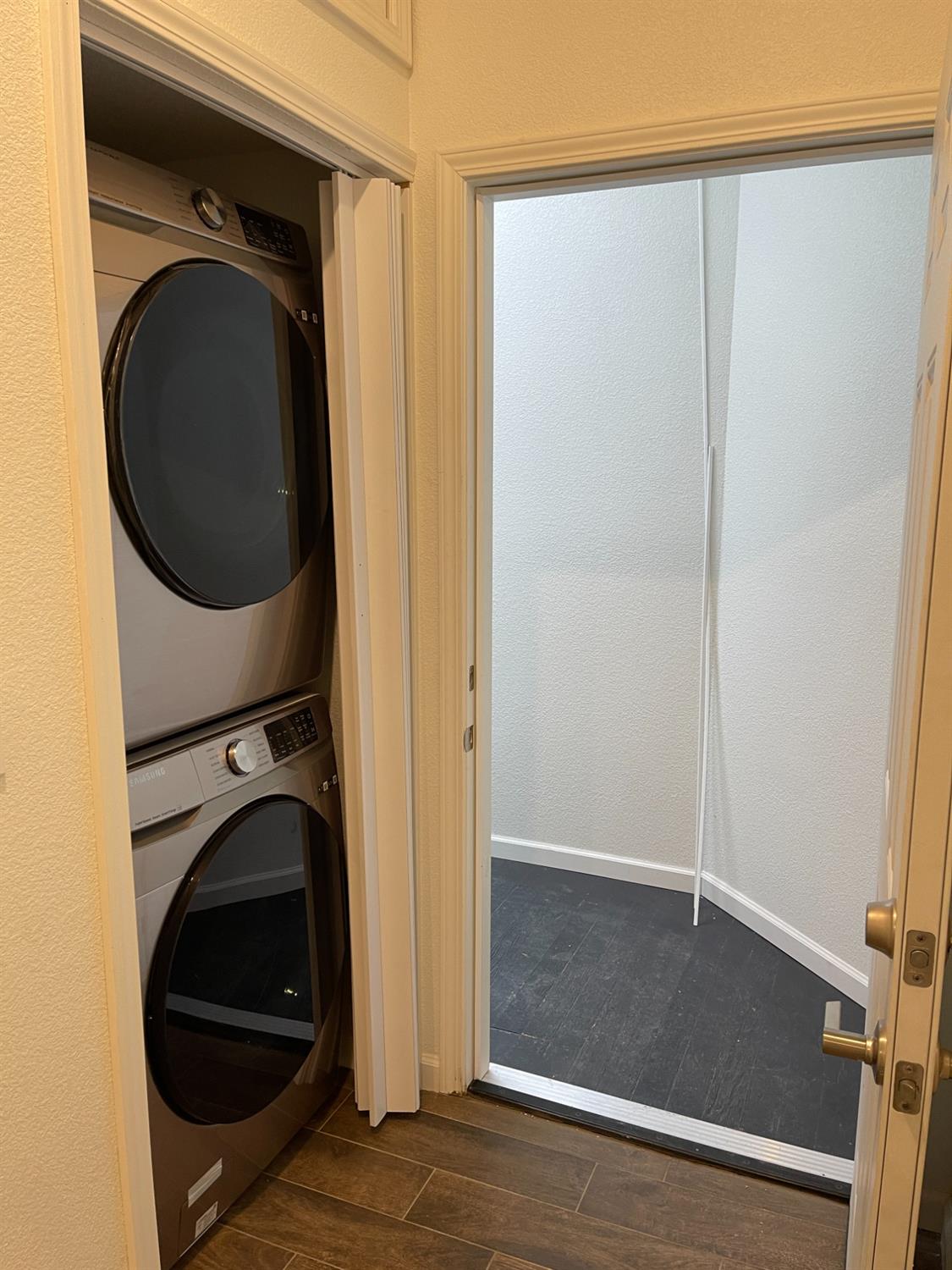 217 5th Street, Unit C Colusa, CA 95932 - Photo 4 of 13 a view of a hallway with washer and dryer
