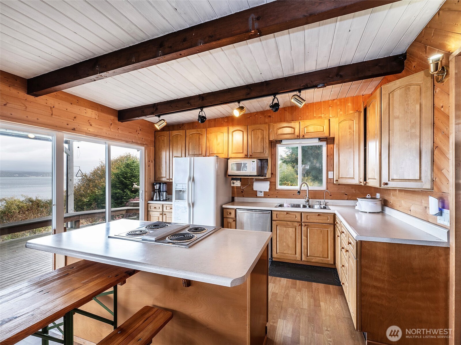 26 E Port Everett, WA 98201 - Photo 8 of 33 a kitchen with a table chairs stove and sink