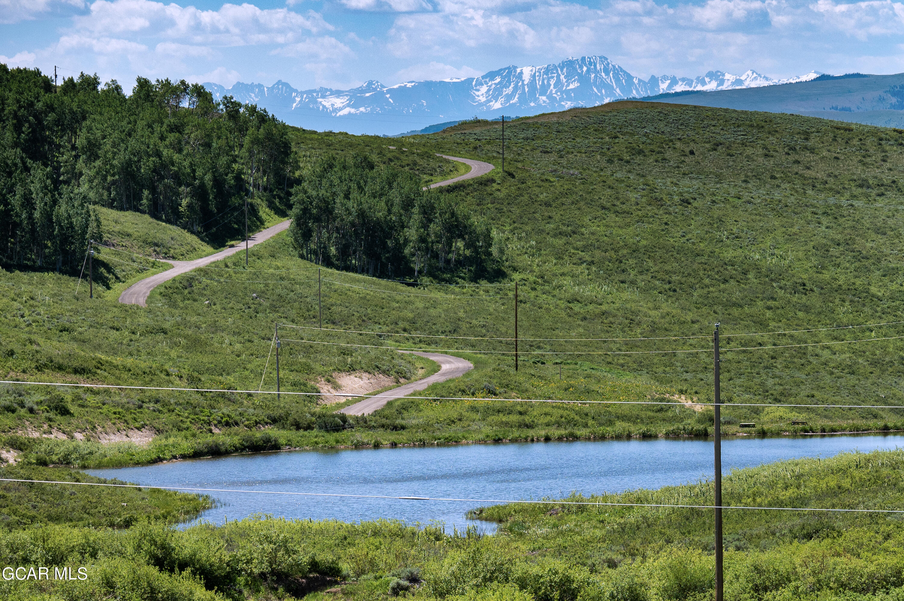 520 Gcr 284 Kremmling, CO 80459 - Photo 11 of 14 a view of a field with an trees