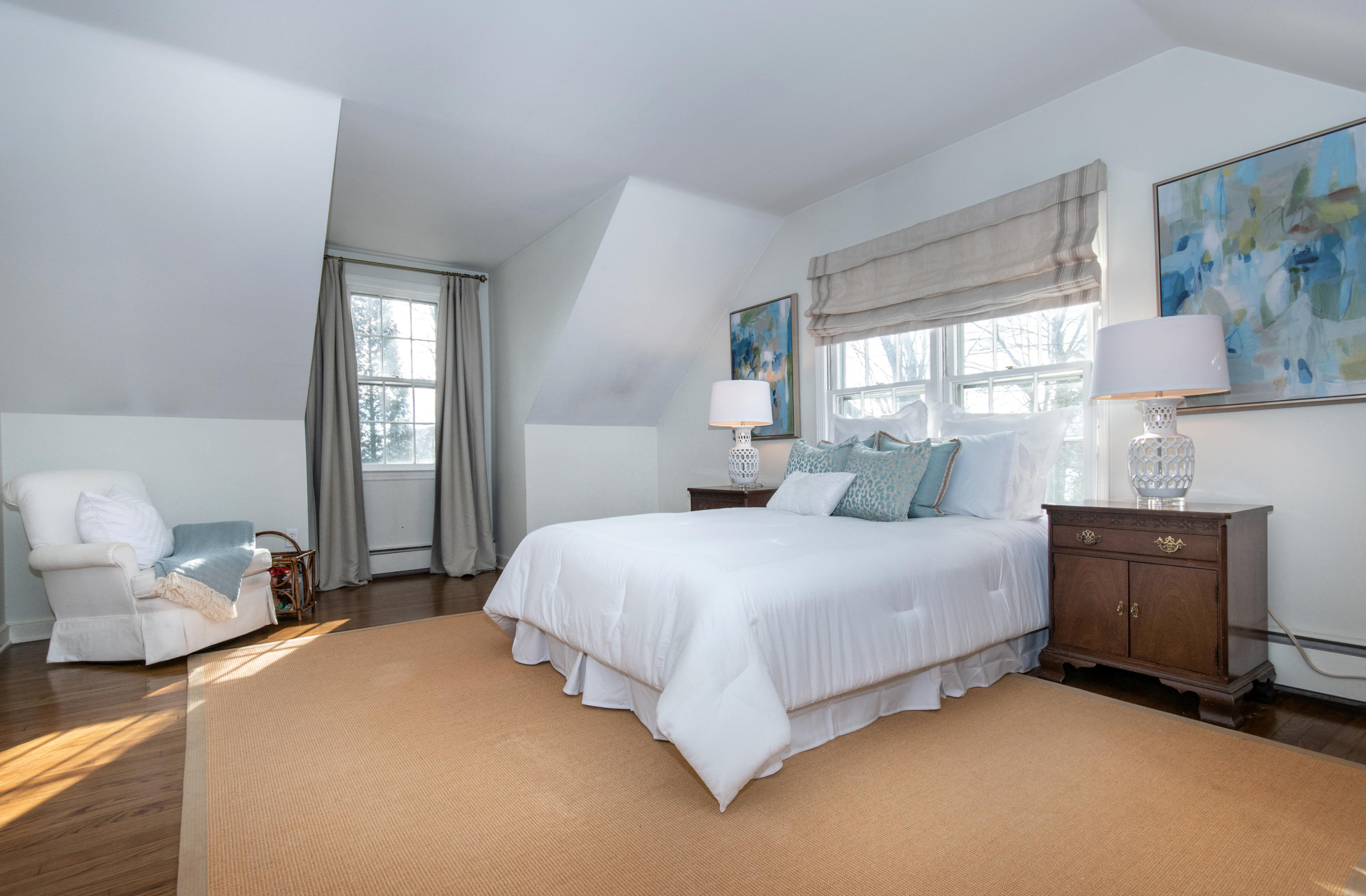 18 Seagate Road Darien, CT 06820 - Photo 14 of 27 a bedroom with a bed and window