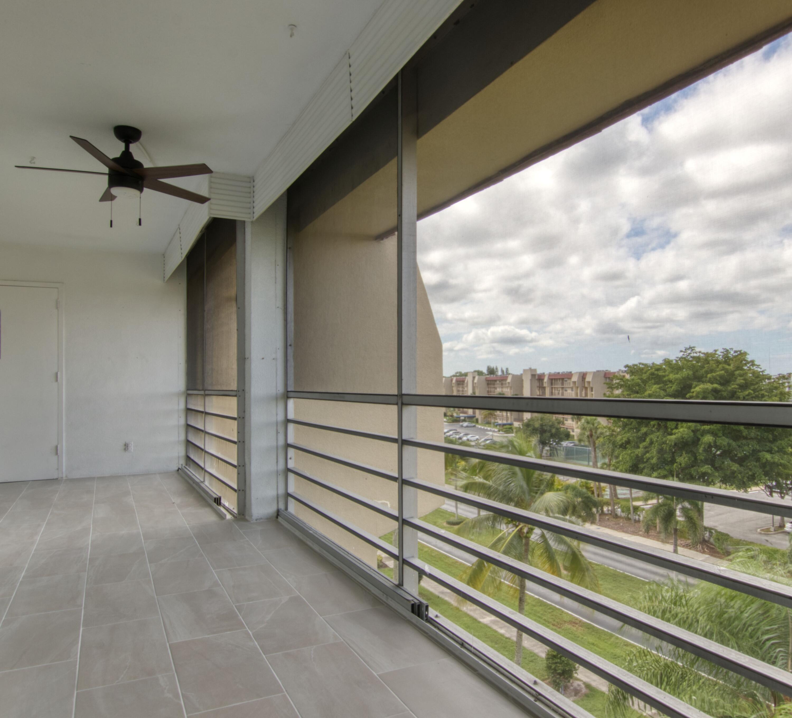 3590 Via Poinciana, Unit 614 Lake Worth, FL 33467 - Photo 13 of 20 a view of balcony with furniture