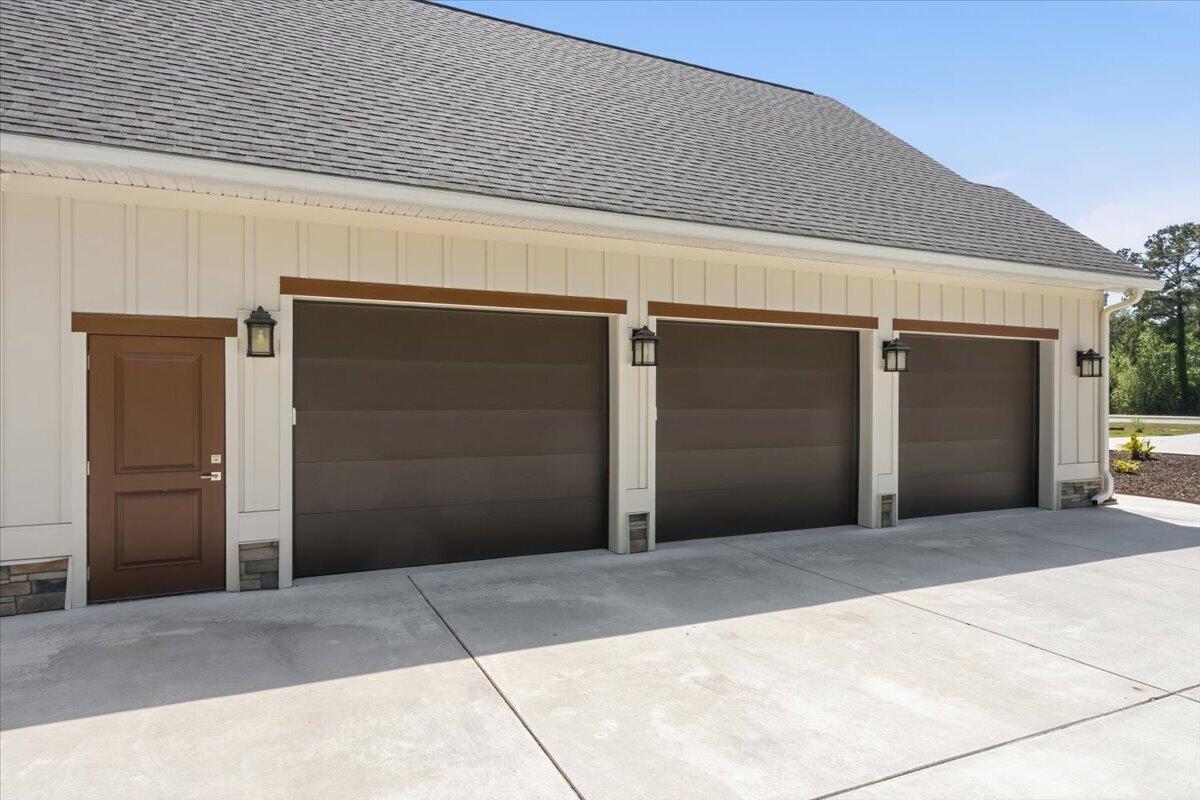 6589 North Highway 17 Awendaw, SC 29429 - Photo 5 of 64 All 3 garage doors - 10'Wx8'H'