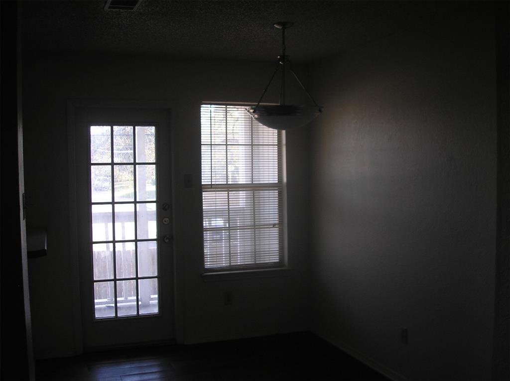 2310 Melissa Drive Waco, TX 76708 - Photo 5 of 10 an empty room with a window