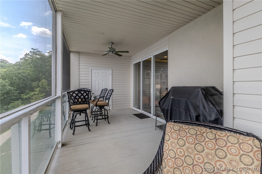 100 Trinity Pointe Drive, Unit 2L Camdenton, MO 65020 - Photo 25 of 43 Ample space on the screened in deck with storage a
